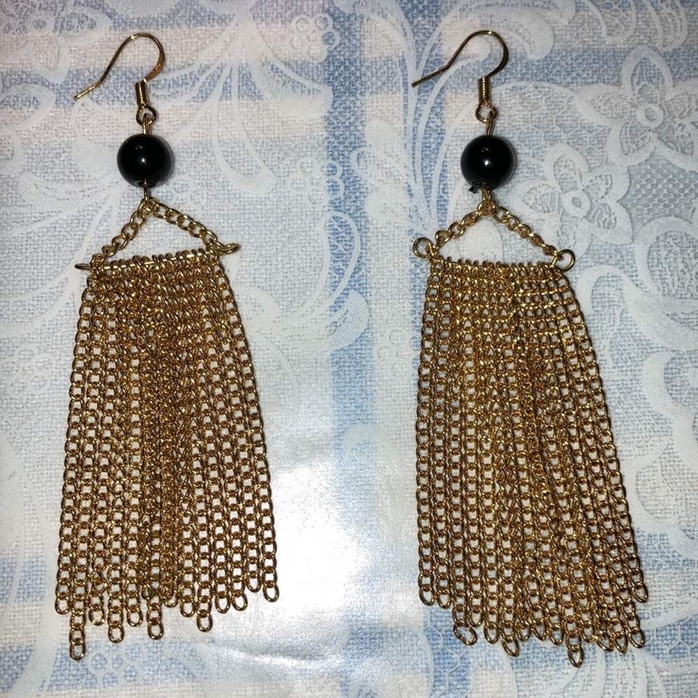 NWOT gt pierced earrings w/blk bead, appx 3 1/2” x 1”, mov. chains.  $19